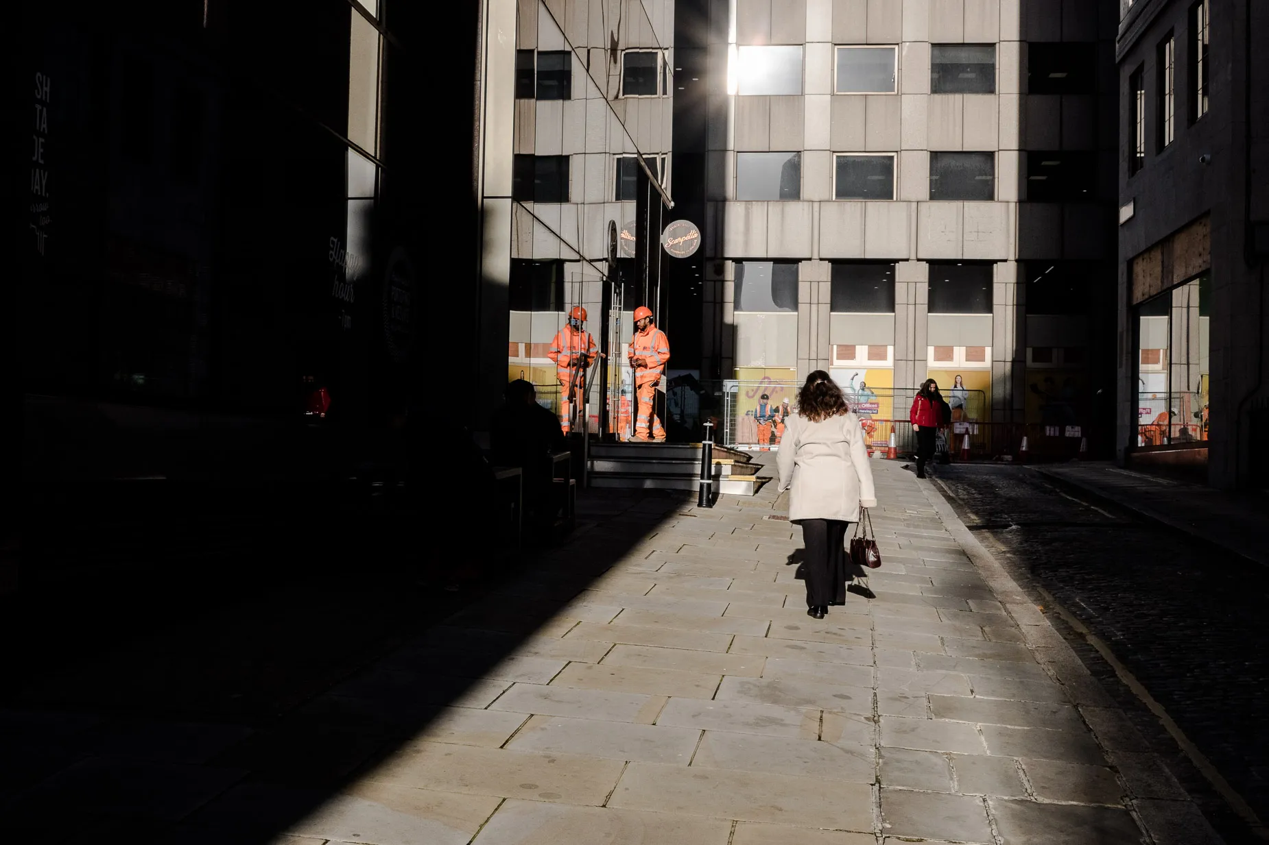 light and shadow scene of city construction and office worker
