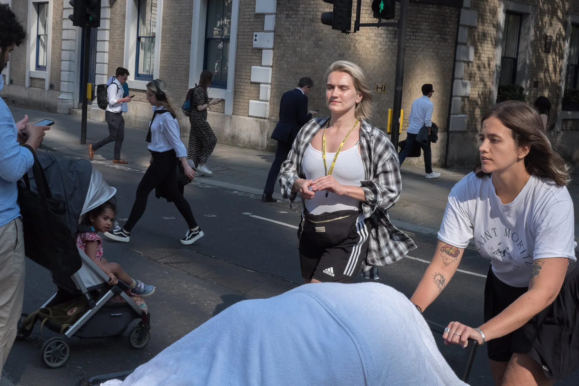 Street scene, people overlapping with rhythmic harmony