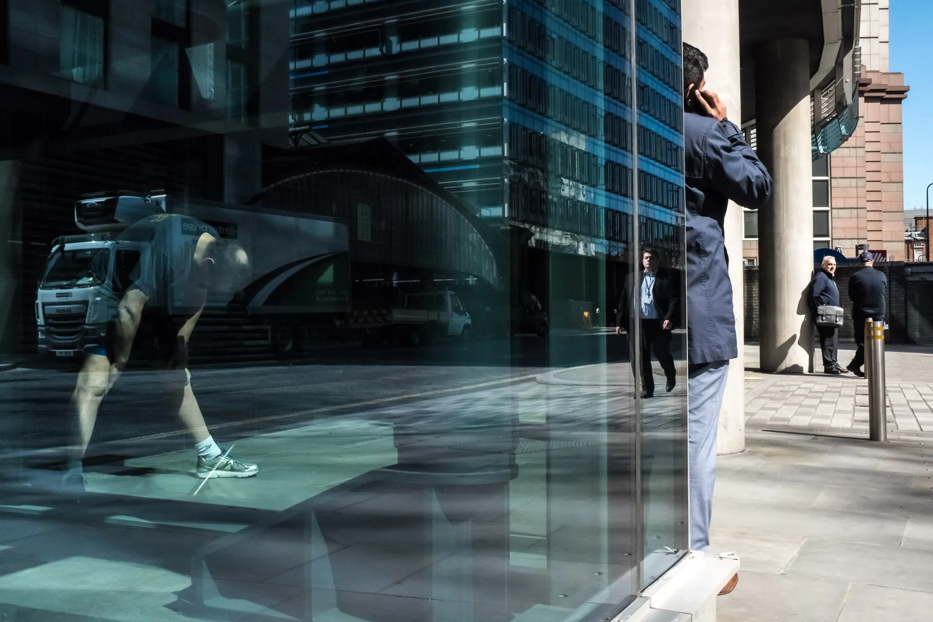 City men in various poses, phone call, conversation, stretching and one walking