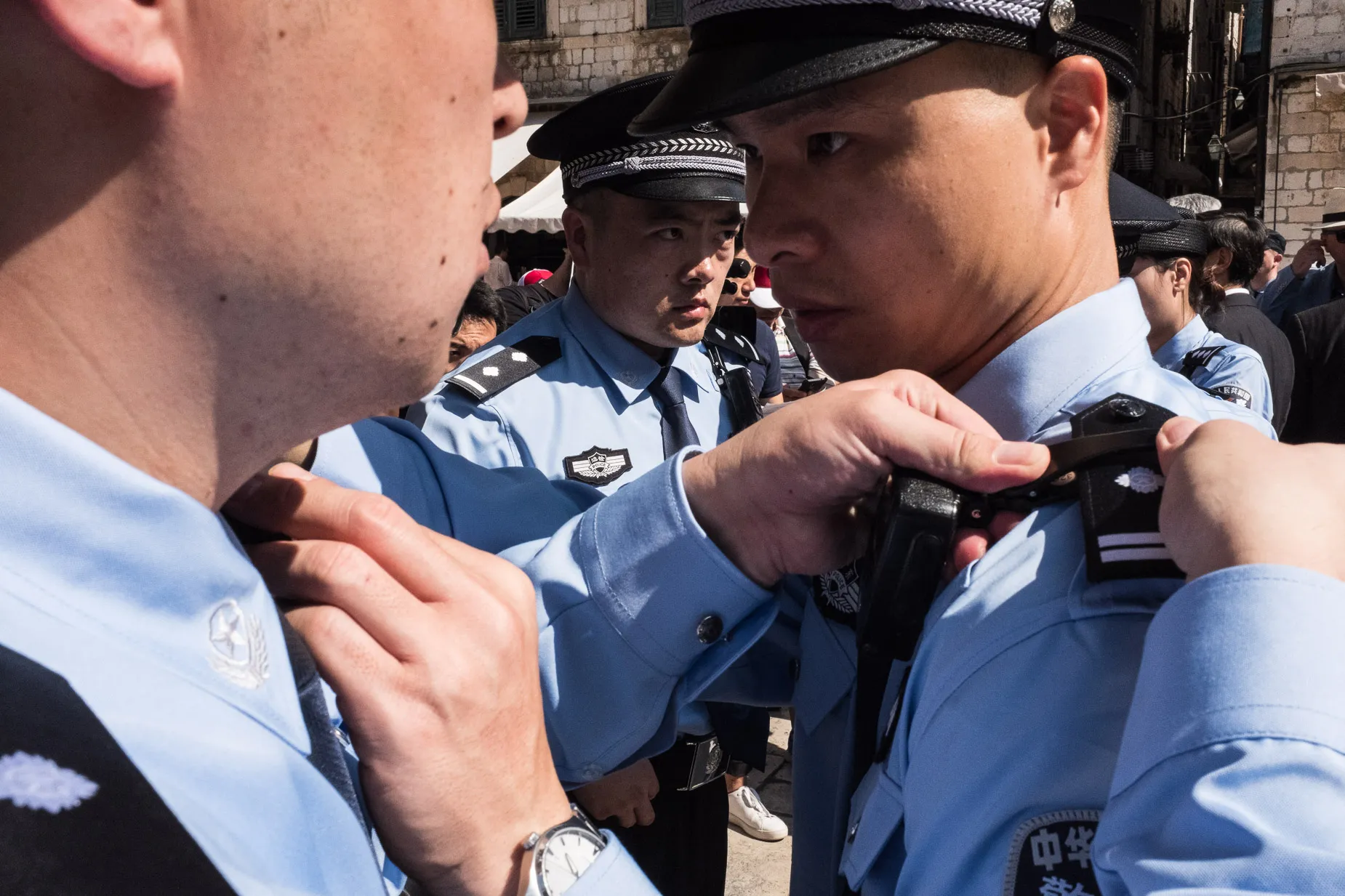 Chinese police ready uniform before parade
