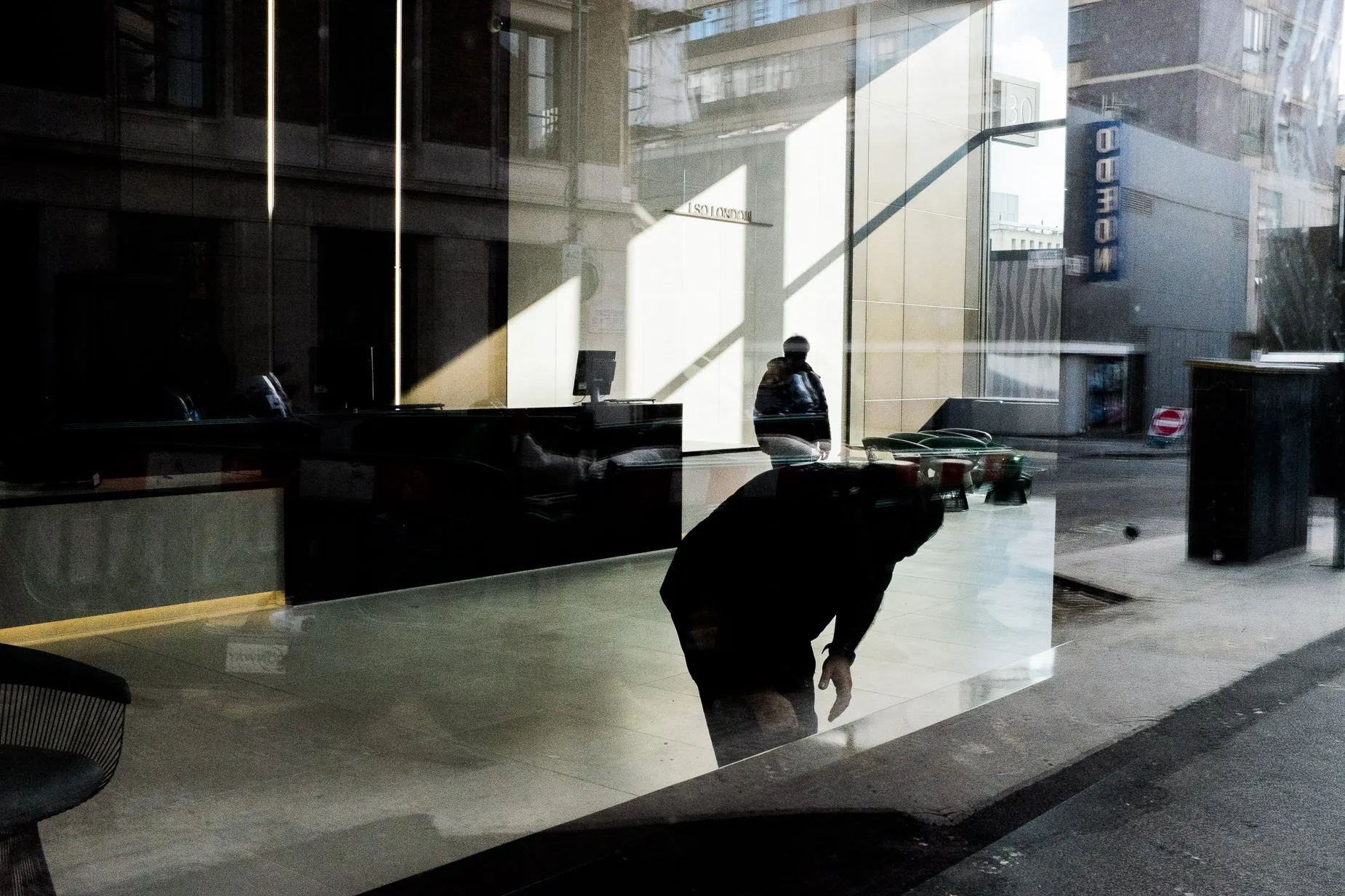 Reflection scene two alluring silhouette characters in foyer