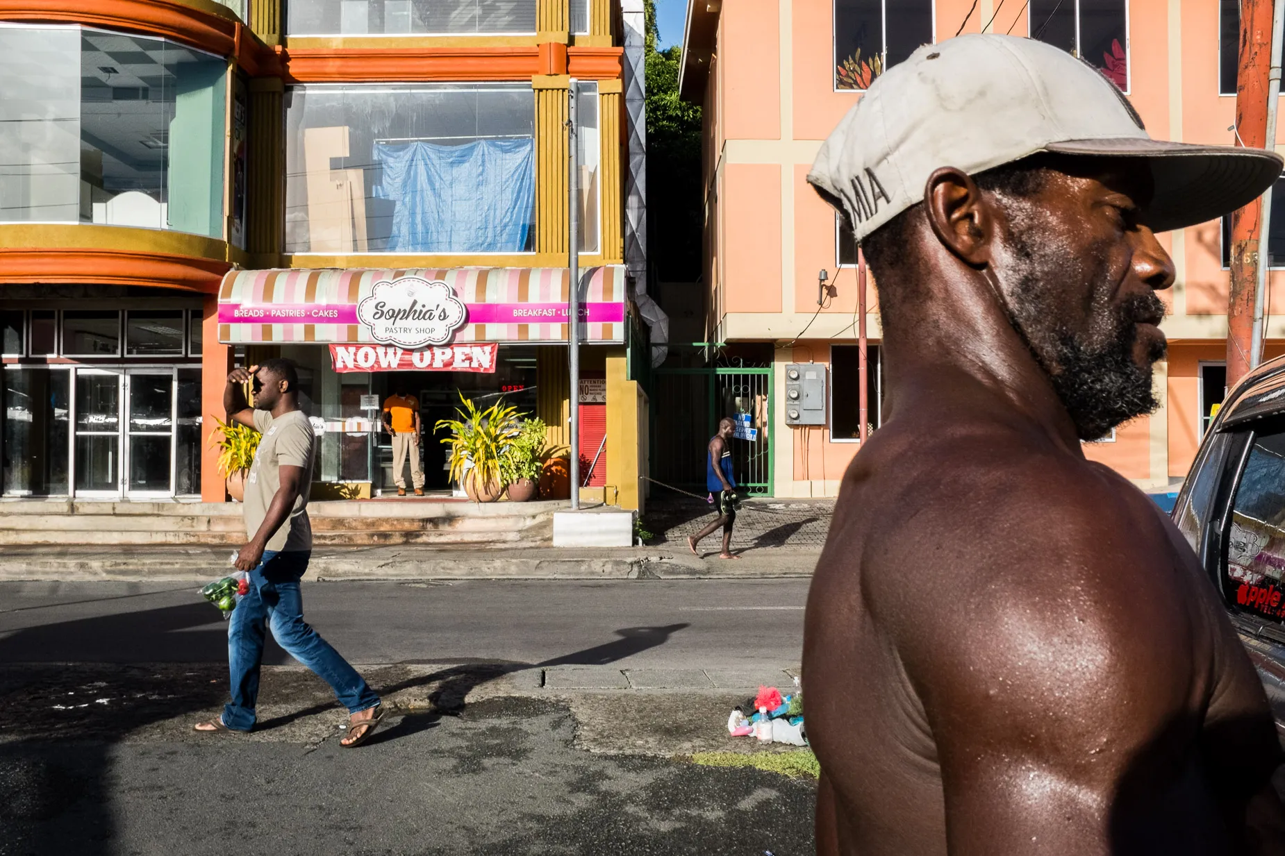 Layered street scene image of men outside Scarborough market street